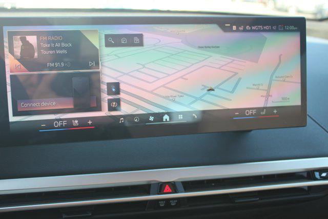 new 2026 BMW iX car, priced at $97,825
