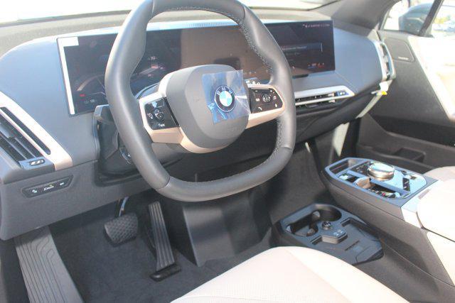 new 2026 BMW iX car, priced at $97,825