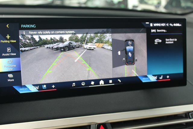 used 2024 BMW iX car, priced at $90,098