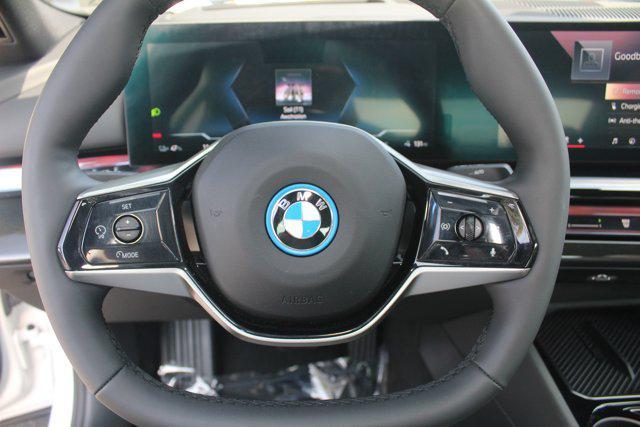 used 2025 BMW i5 car, priced at $62,048