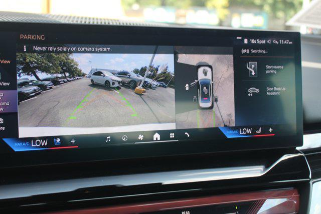 used 2025 BMW i5 car, priced at $62,048