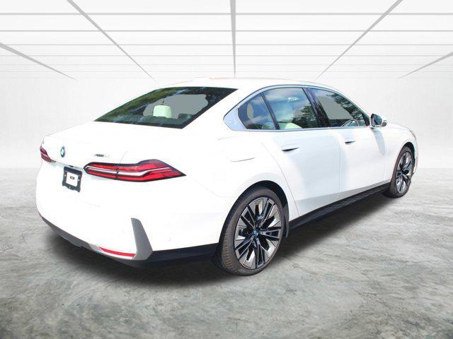 used 2025 BMW i5 car, priced at $62,048