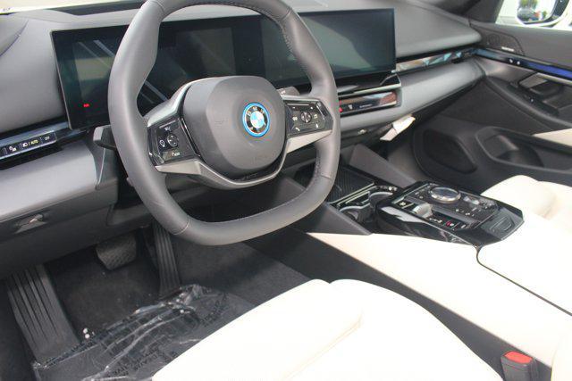 used 2024 BMW i5 car, priced at $47,998