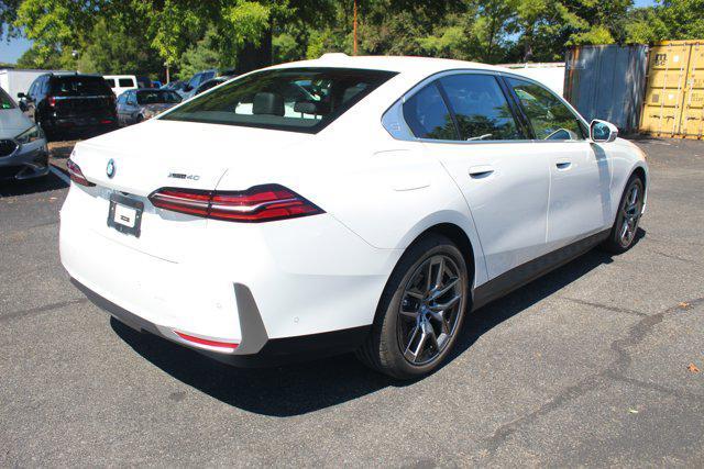 used 2025 BMW i5 car, priced at $59,008