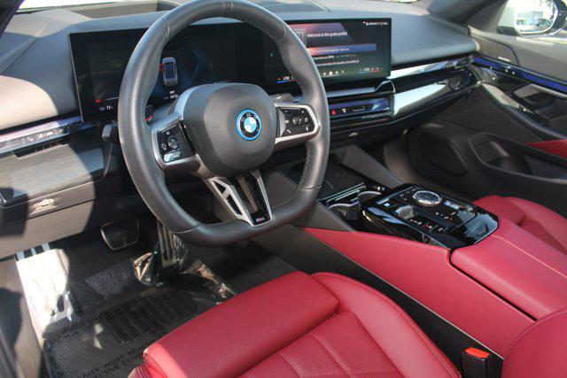 used 2025 BMW i5 car, priced at $62,998