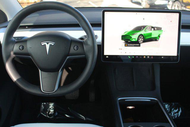 used 2023 Tesla Model Y car, priced at $34,998