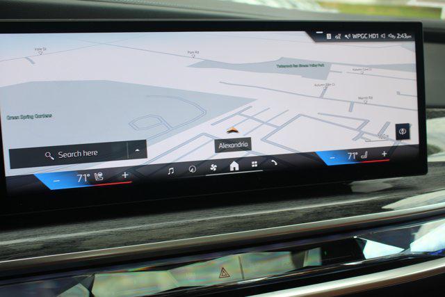 used 2024 BMW 740 car, priced at $82,998