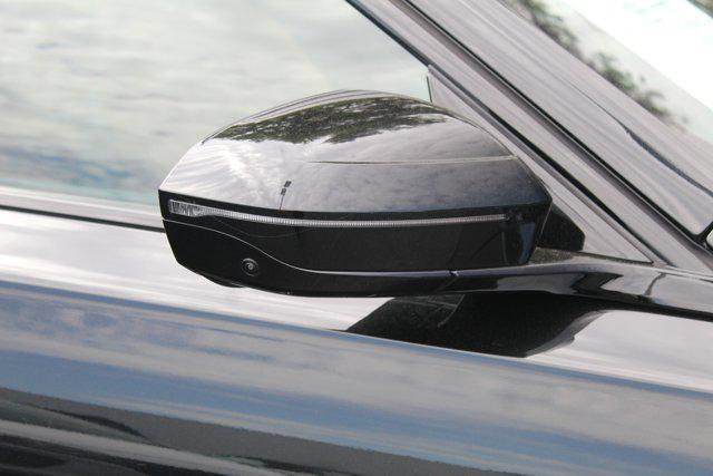 used 2024 BMW 740 car, priced at $82,998