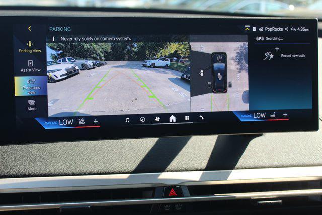 new 2025 BMW iX car, priced at $97,495