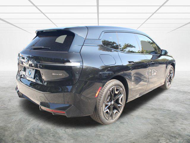 new 2025 BMW iX car, priced at $97,495