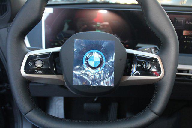 new 2025 BMW iX car, priced at $97,205