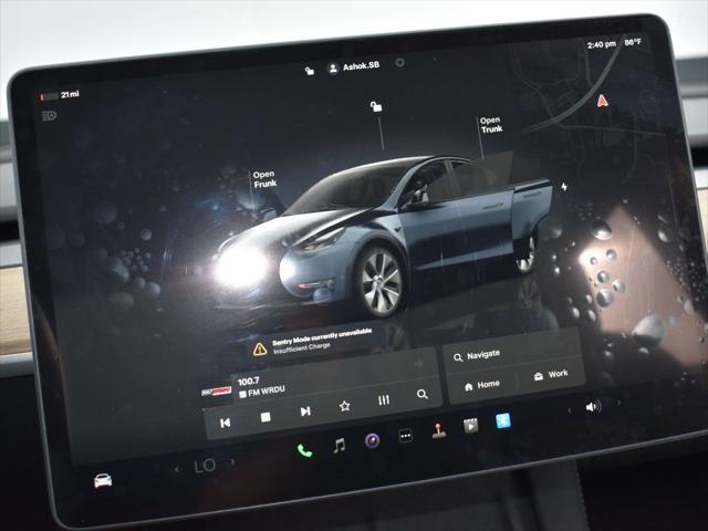 used 2024 Tesla Model Y car, priced at $35,478