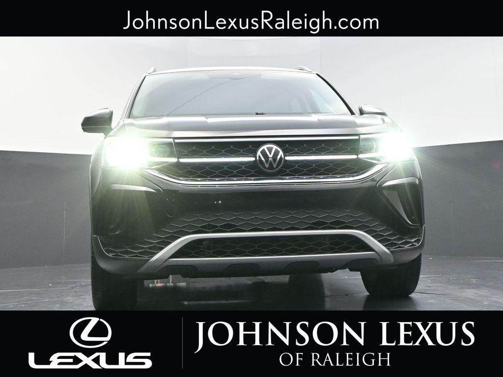 used 2023 Volkswagen Taos car, priced at $23,458