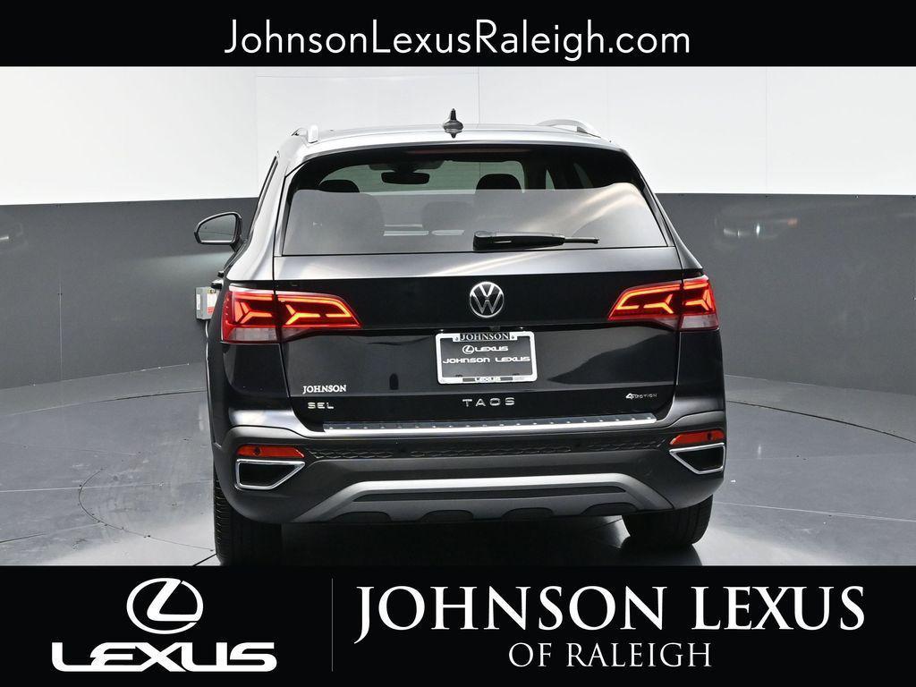 used 2023 Volkswagen Taos car, priced at $23,458