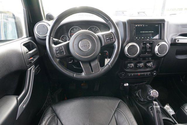 used 2013 Jeep Wrangler Unlimited car, priced at $17,699