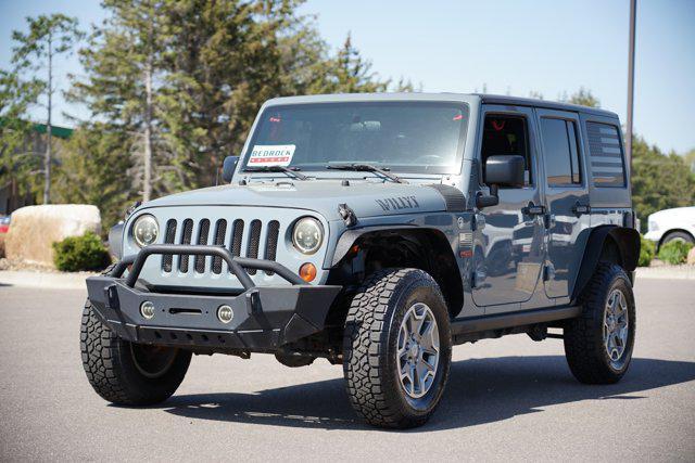 used 2015 Jeep Wrangler Unlimited car, priced at $19,599