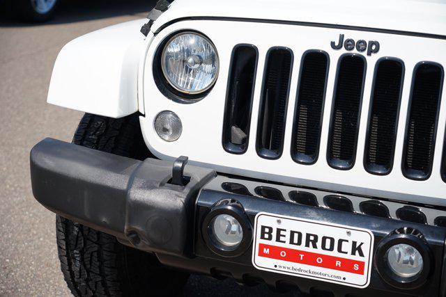 used 2015 Jeep Wrangler Unlimited car, priced at $17,699