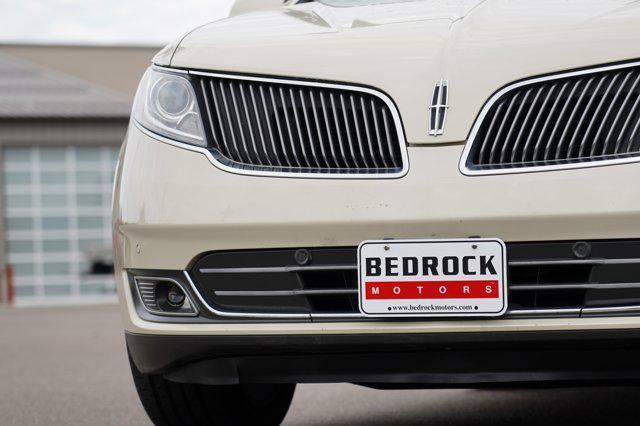 used 2014 Lincoln MKS car, priced at $15,899