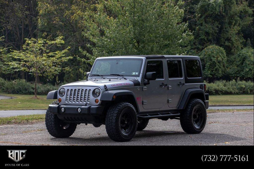 used 2013 Jeep Wrangler Unlimited car, priced at $15,495