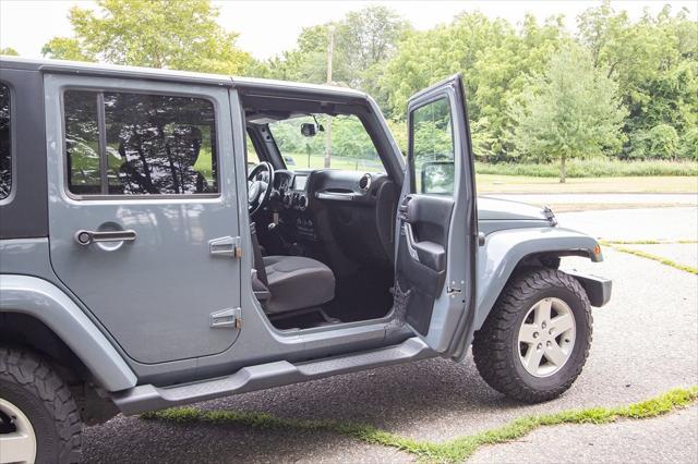 used 2015 Jeep Wrangler Unlimited car, priced at $16,900