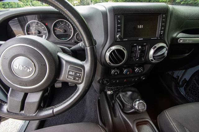 used 2015 Jeep Wrangler Unlimited car, priced at $16,900