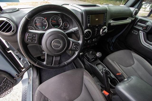 used 2015 Jeep Wrangler Unlimited car, priced at $16,900