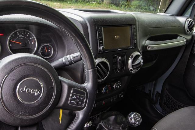 used 2015 Jeep Wrangler Unlimited car, priced at $16,900