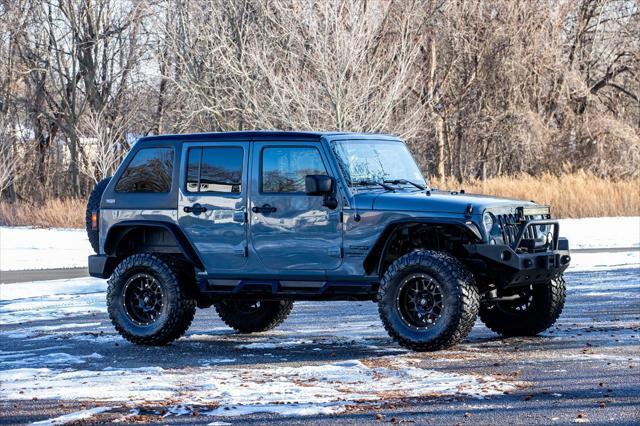 used 2015 Jeep Wrangler Unlimited car, priced at $15,900