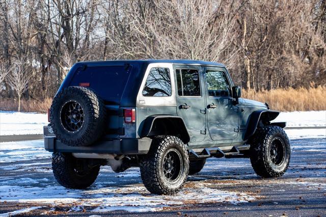 used 2015 Jeep Wrangler Unlimited car, priced at $15,900