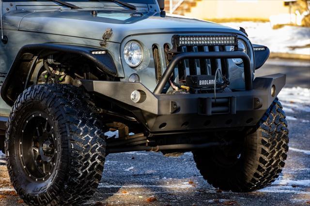 used 2015 Jeep Wrangler Unlimited car, priced at $15,900