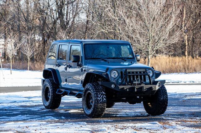 used 2015 Jeep Wrangler Unlimited car, priced at $15,900