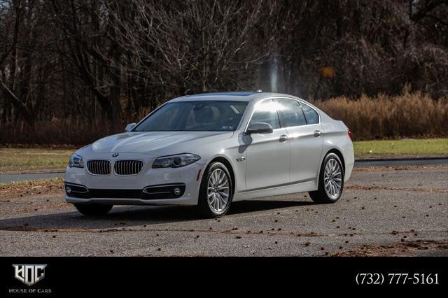 used 2015 BMW 528 car, priced at $16,900