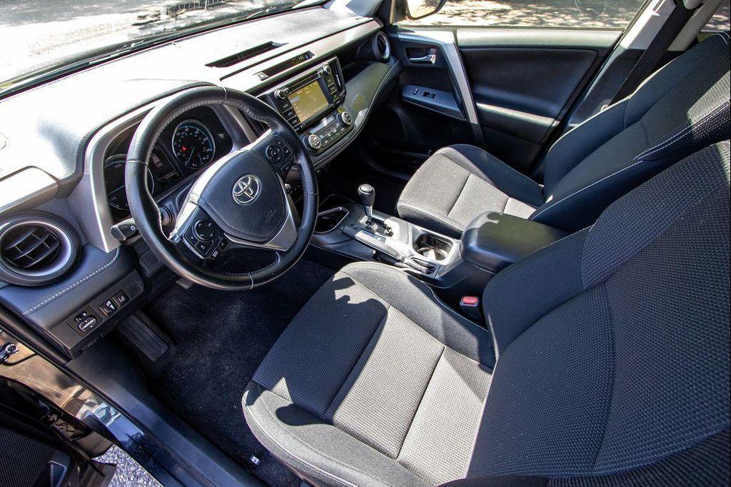 used 2018 Toyota RAV4 Hybrid car, priced at $12,495