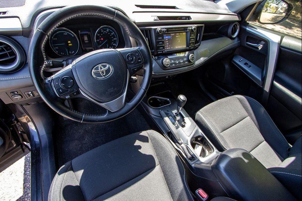 used 2018 Toyota RAV4 Hybrid car, priced at $12,495