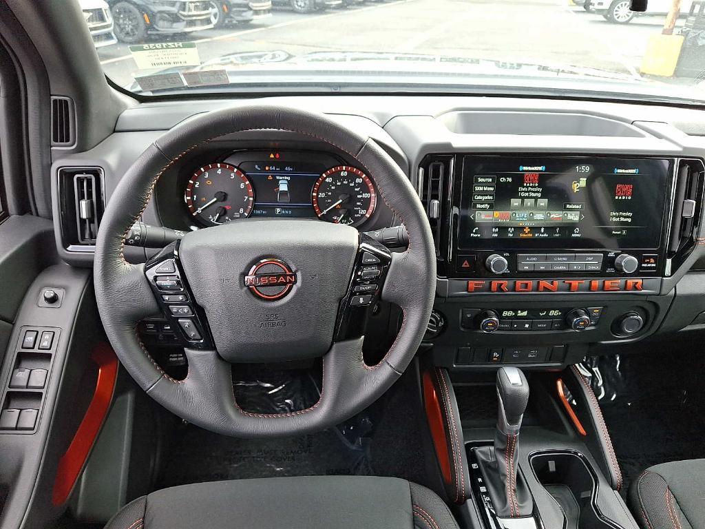 used 2025 Nissan Frontier car, priced at $38,998