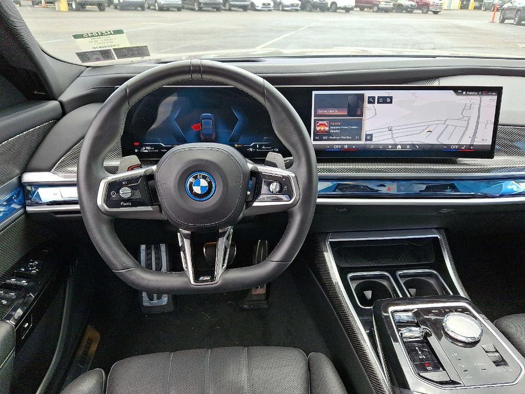 used 2024 BMW 750e car, priced at $79,598