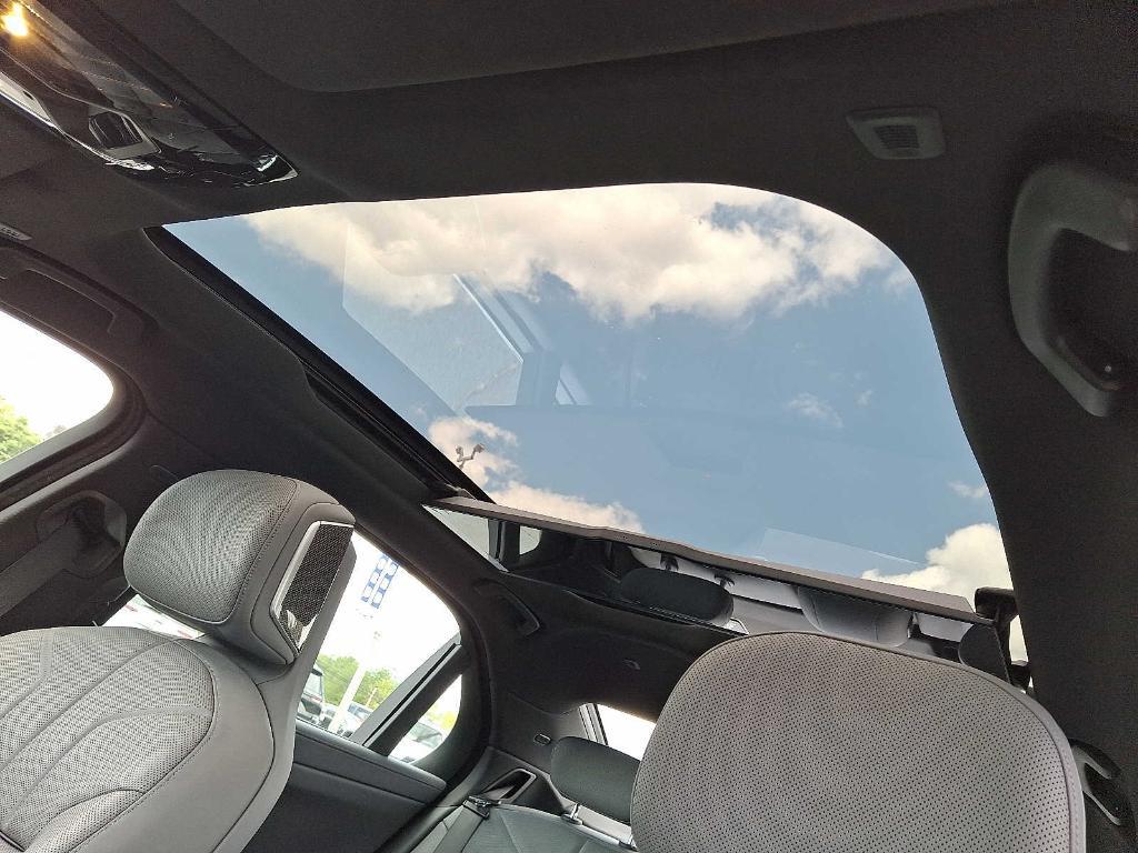 used 2024 BMW 750e car, priced at $79,598