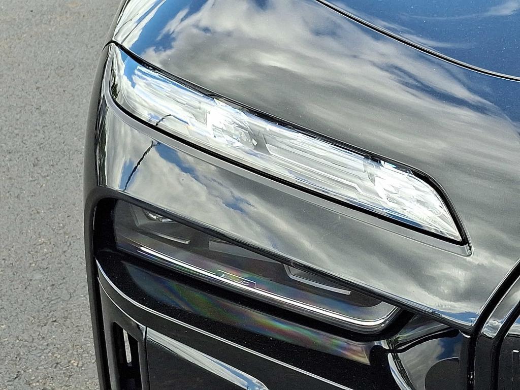 used 2024 BMW 750e car, priced at $79,598