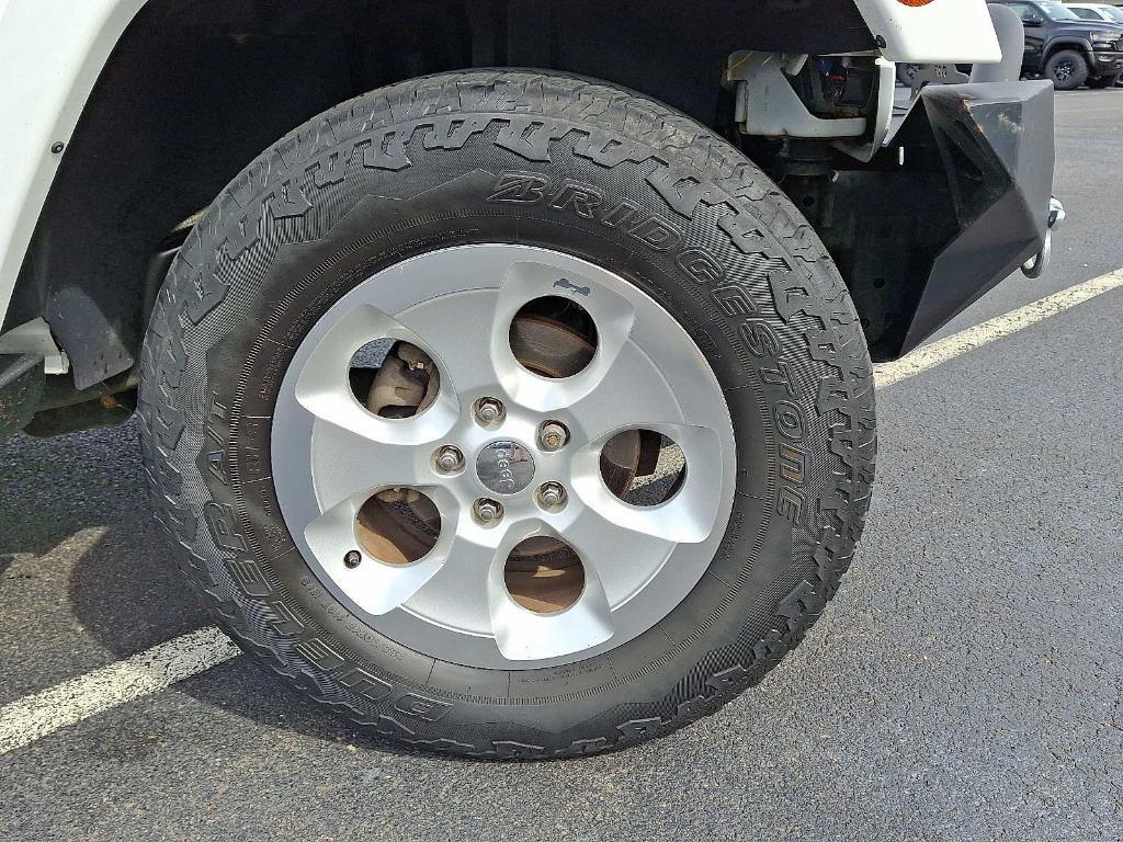 used 2014 Jeep Wrangler Unlimited car, priced at $17,448
