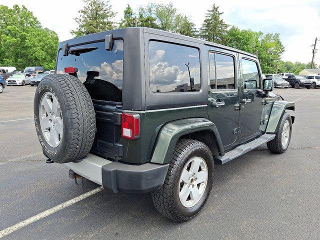 used 2011 Jeep Wrangler Unlimited car, priced at $12,888