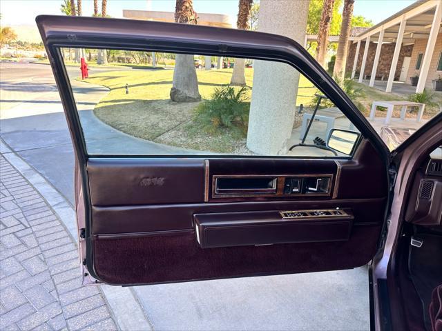 used 1986 Cadillac DeVille car, priced at $6,900