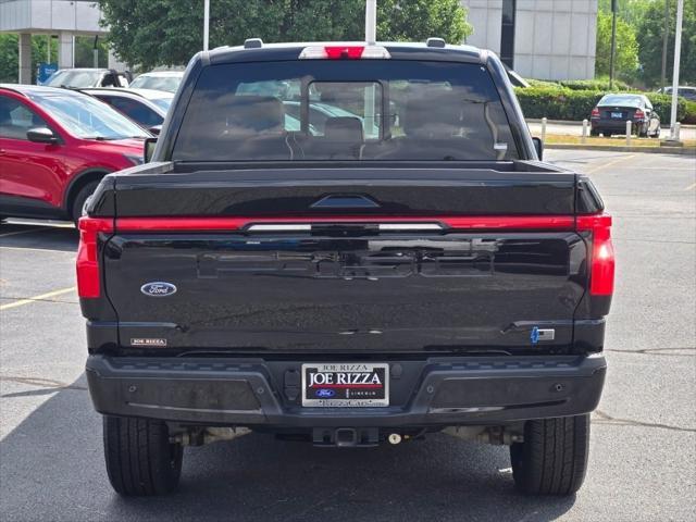 used 2023 Ford F-150 Lightning car, priced at $57,590