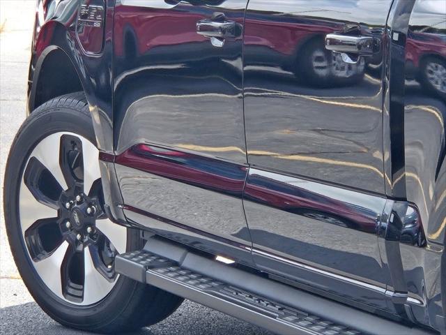 used 2023 Ford F-150 Lightning car, priced at $57,590
