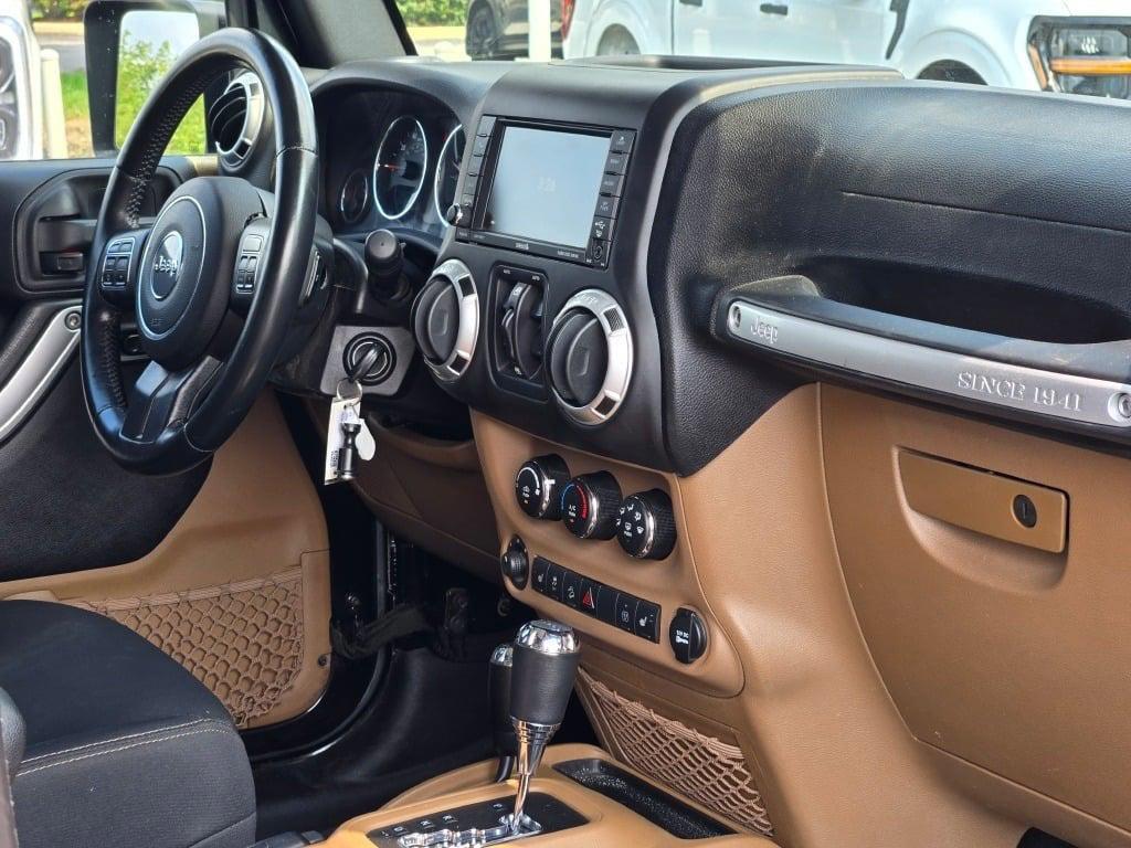used 2015 Jeep Wrangler Unlimited car, priced at $21,990