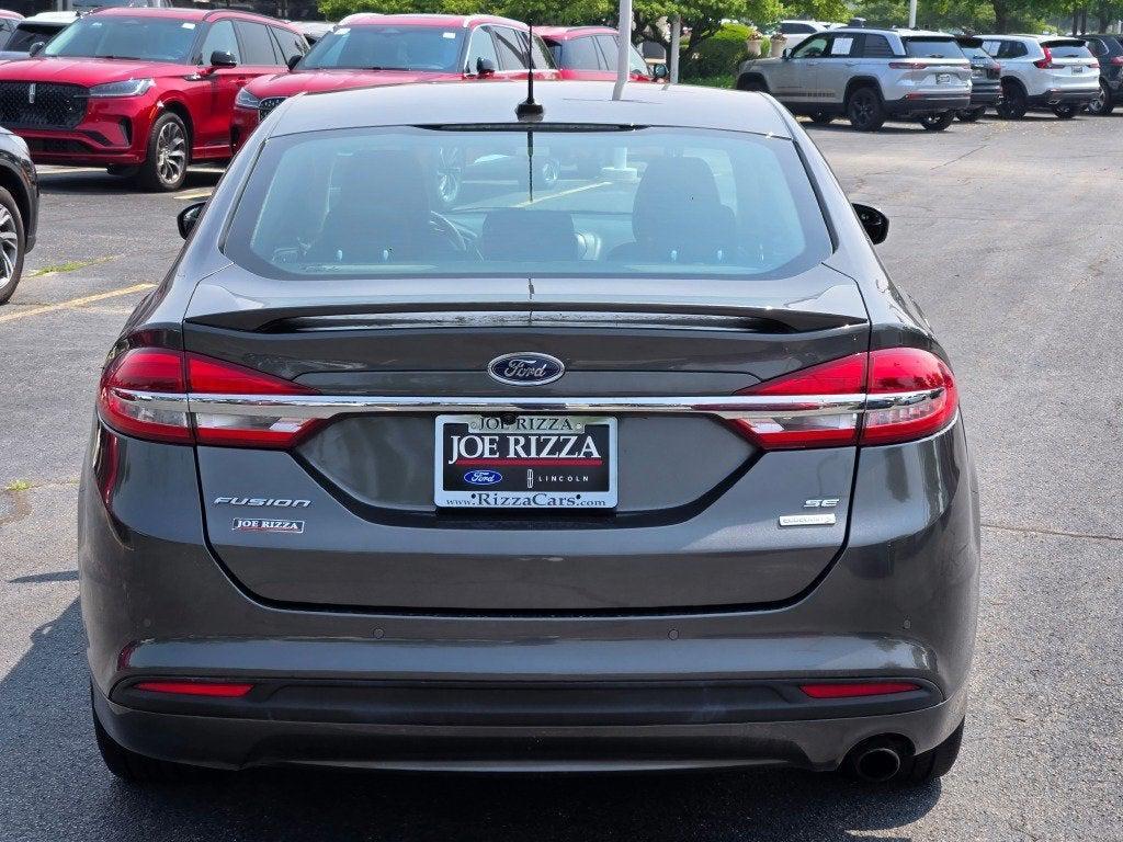 used 2018 Ford Fusion car, priced at $12,990