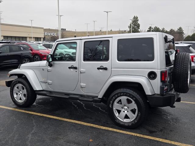 used 2011 Jeep Wrangler Unlimited car, priced at $15,890