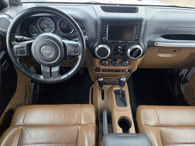 used 2011 Jeep Wrangler Unlimited car, priced at $15,890