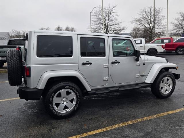 used 2011 Jeep Wrangler Unlimited car, priced at $15,890