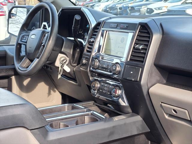 used 2018 Ford F-150 car, priced at $23,390