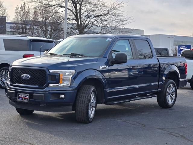 used 2018 Ford F-150 car, priced at $23,390